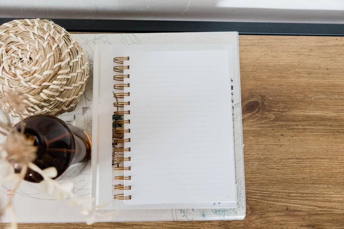 Notebook on Wooden Desk